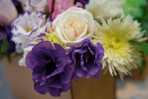 white, purple roses . Purple, white, yellow flowers. Purple, white, yellow flower bouquet .