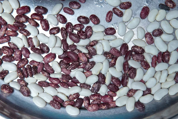 Texture background red dotted beans. Product Image red and white beans . Red and white beans .