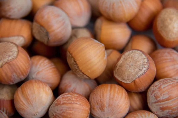 Voedselachtergrond. Hazelnoten textuur. Bovenaanzicht. Hazelnoot Nut Gezondheid Organische Bruin Filbert Herfst Achtergrond Concept. Hazelnoten. Stapel hazelnoten. — Stockfoto