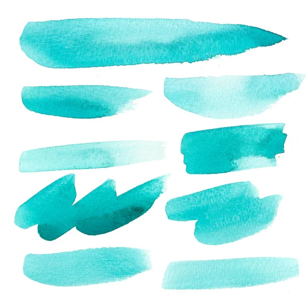 Beyaz zemin üzerine suluboya fırça darbeleri kümesi.