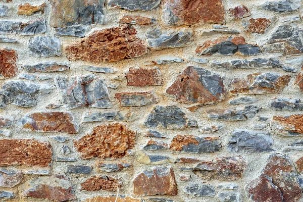Каменная стена забор деревенской текстуры задний план. — стоковое фото