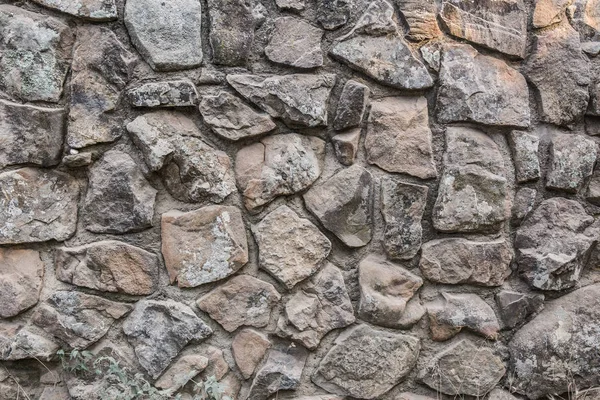 Stone Wall Rough Unprocessed Stones Background — Stock Photo, Image