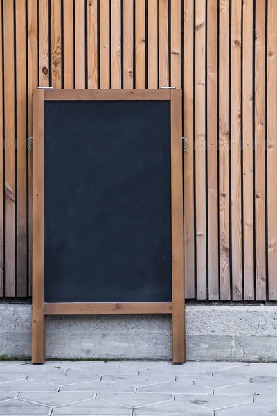 Black Chalky Advertising Pillar Wooden Wall — Stock Photo, Image