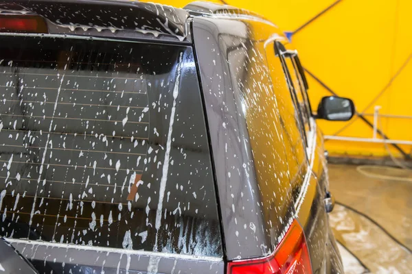 Auto bij car wash shampoos — Stockfoto