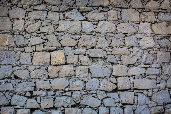 Background Stone Wall Rough Unprocessed Stones — Stock Photo, Image