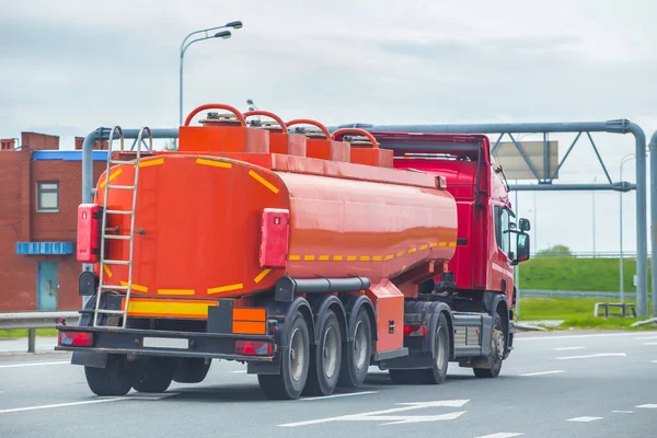 big fuel truck goes on the country highway