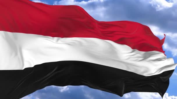 Флаг Размахивающий Ветру Против Голубого Неба Йемена — стоковое видео