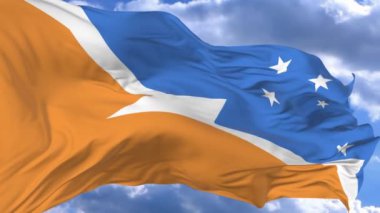 bayrak mavi karşı rüzgarda sallayarak Tierra del Fuego il Arjantin gökyüzü