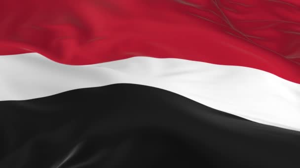 agitant dans le vent un drapeau en boucle comme fond Yémen 