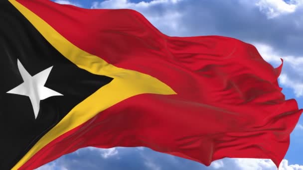 Прапор Махав Вітрі Проти Синього Неба Східного Тимору — стокове відео