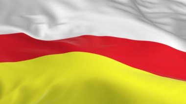 rüzgarda sallayarak bayrak ilmekledi bir arka plan olarak Kuzey Osetya