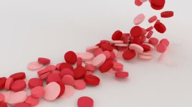 pek çok kırmızı tablet beyaz yüzey formu bir kalp şekli üzerinde düşmek
