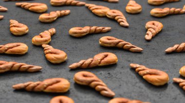 3d çizim, siyah yakın çekim yalan bükülmüş iştah açıcı çörekler çok