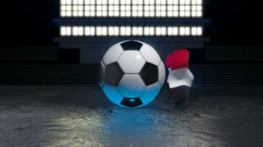 Irak bayrağı kendi ekseni etrafında dönen bir futbol topu etrafında uçuyor