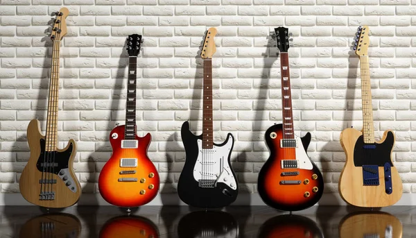 Varias Guitarras Eléctricas Sobre Fondo Pared Ladrillo Ilustración — Foto de Stock