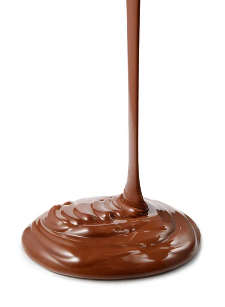 Közelről csokoládé áramlás elszigetelt fehér background — Stock Fotó
