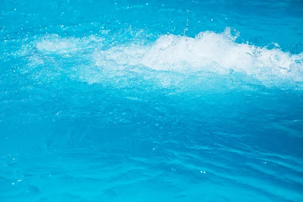 Fondo ondulado agua azul — Foto de Stock