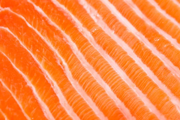 Macro de salmão. Macro de peixe vermelho fresco. Fundo de salmão . — Fotografia de Stock