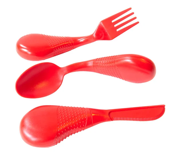 Set Red Plastic Ergonomic Eating Utensils Knife Fork Spoon Isolated — Stock Photo, Image