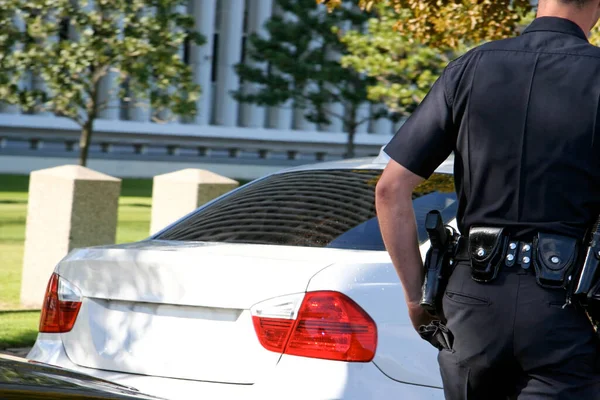 Rear View Traffic Officer Cautiously Approaching Stopped Vehicle Horizontal — Stock Photo, Image