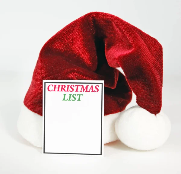 Lista Życzeń Bożego Narodzenia Czerwono Białym Kapeluszem Świętego Mikołaja — Zdjęcie stockowe