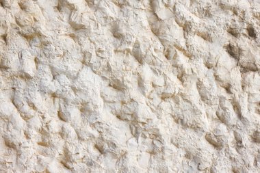 Bej pürüzsüz taş duvar doku