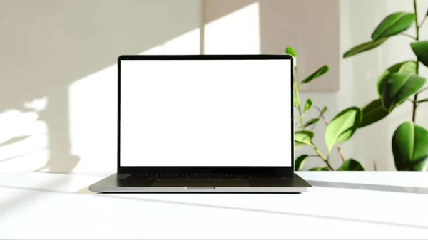 Das Foto Eines Laptops Auf Einem Weißen Schreibtisch Mit Einer lizenzfreie Stockfotos