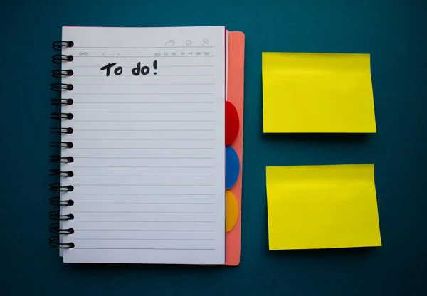 colorful blank sticky note or empty post notes with office clamps on blue background for reminder remember on working or appointment with customer, coworker, supplier, teamwork and etc.