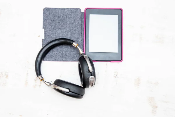 White Worn Background Lies Open Book Black Headphone — Stock Photo, Image