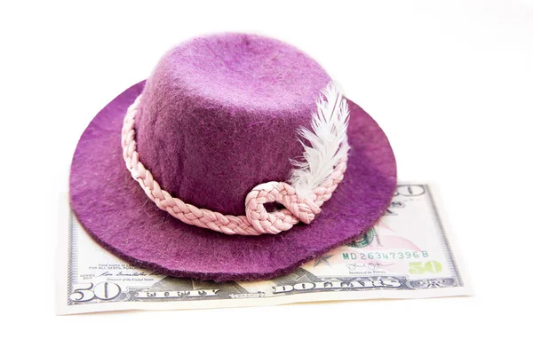 Dollar Bills Lie Little Purple Felt Hat — Stock Photo, Image