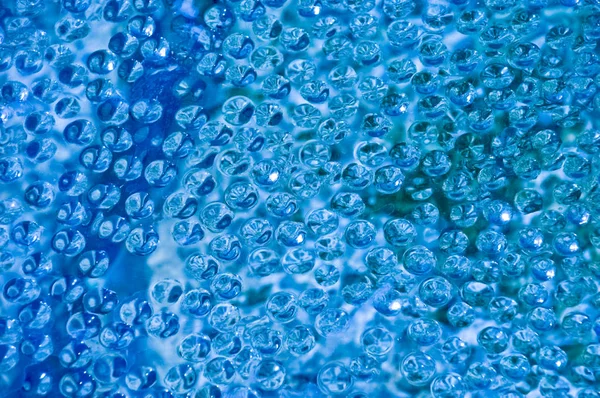 Gotas de agua sobre fondo cian, textura, espacio de copia — Foto de Stock