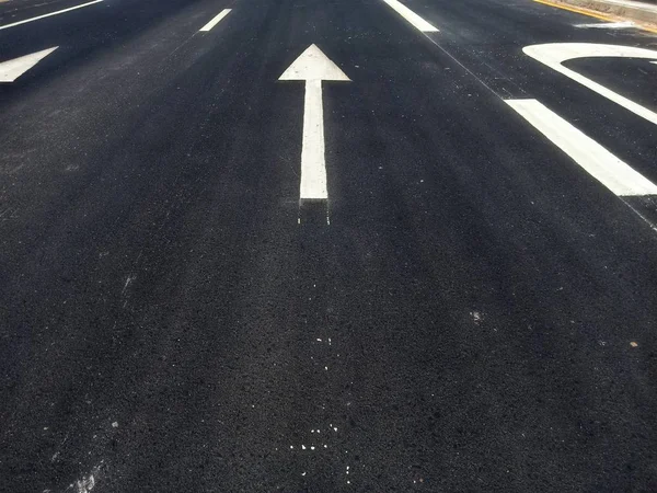 Road traffic paint White on the asphalt surface — Stock Photo, Image