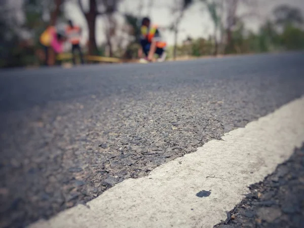 Road traffic paint White on the asphalt surface