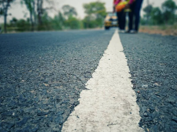 Road traffic paint White on the asphalt surface