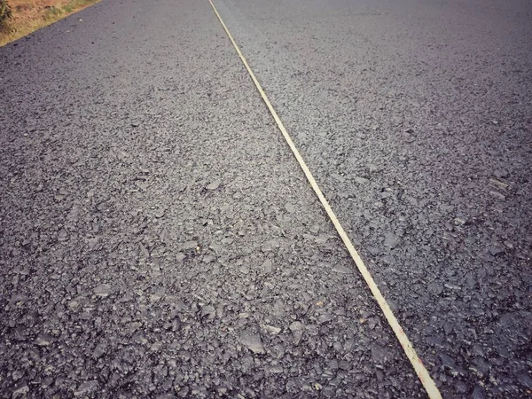 Road traffic paint White on the asphalt surface