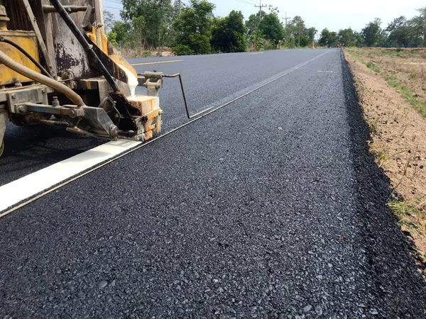 Road traffic paint White on the asphalt surface — Stock Photo, Image