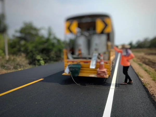 Road traffic paint White on the asphalt surface