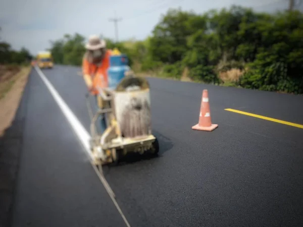 Pintura de tráfico Blanco en la superficie de asfalto — Foto de Stock