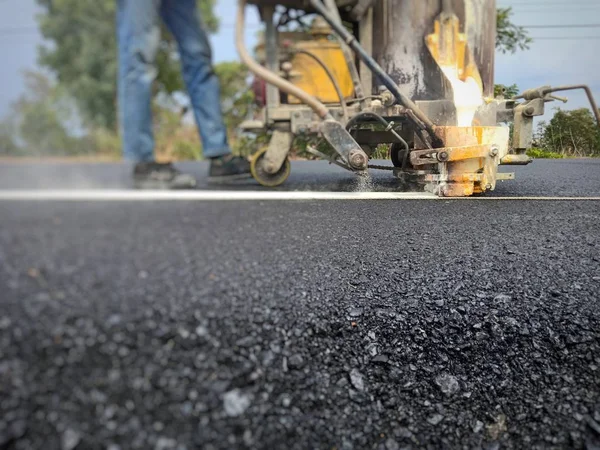 Road traffic paint White on the asphalt surface — Stock Photo, Image