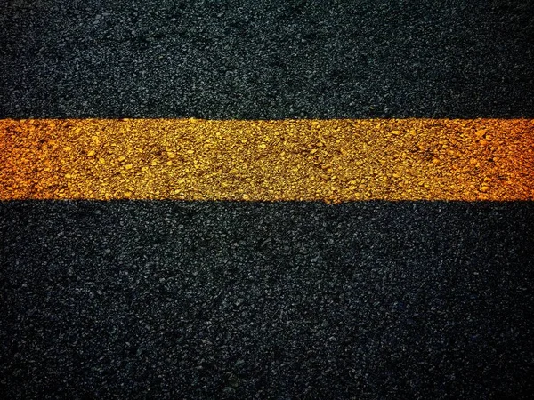 Road traffic paint Yellow on the asphalt surface — Stock Photo, Image