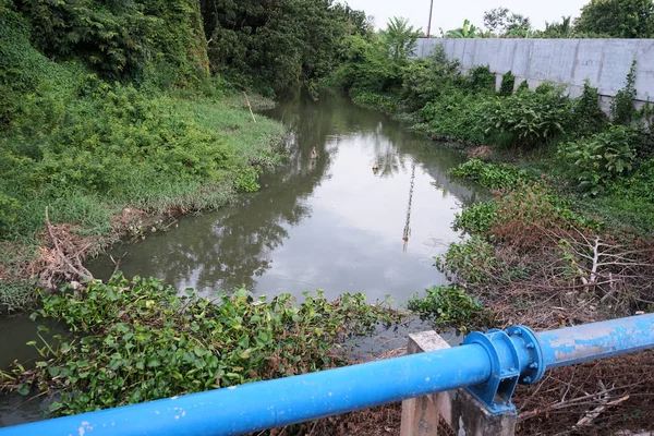 Waste water drainage canal from community areas in Thailand