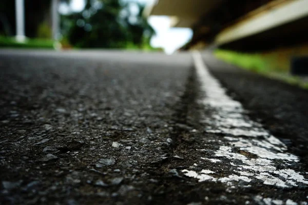 Road traffic paint on the asphalt surface — Stock Photo, Image