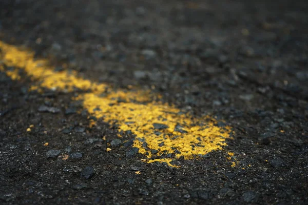 The paved road has yellow traffic lines on the surface. Blurred — Stock Photo, Image