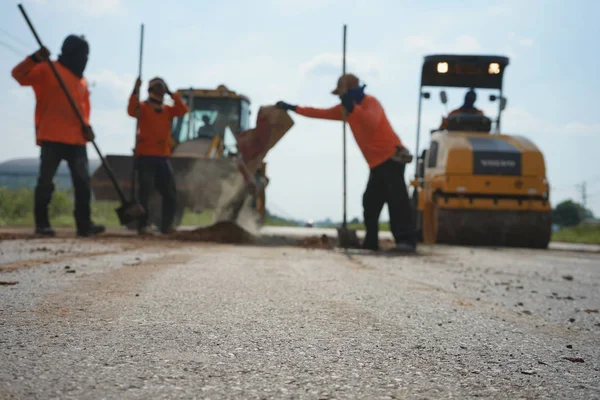 Repairing a damaged road To allow people to travel safely (blurr
