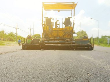 Yol yüzeyi makinelerinin yol inşaatının bulanık görüntüsü