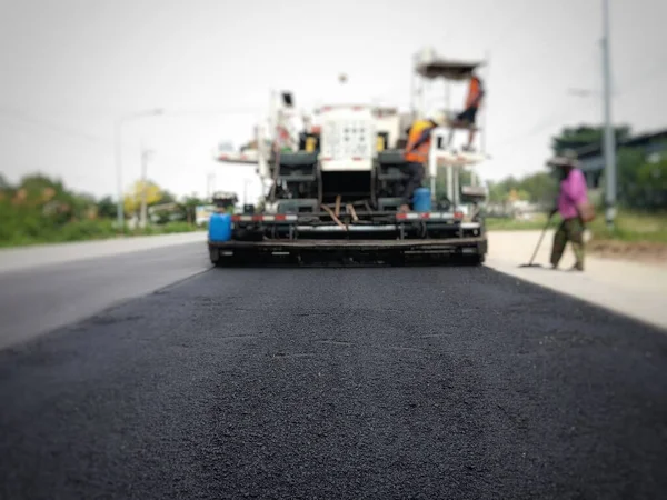ASPHALT HOT MIX IN - Place RECYCLING (bulanık resim).