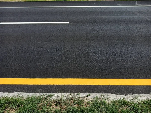 Yellow traffic line color For the safety of traveling in thailan