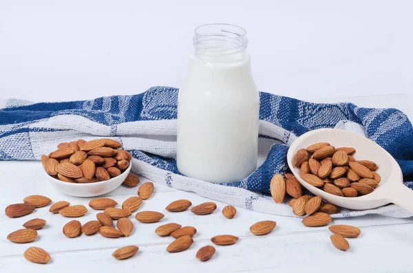 Almond Milk Glass Spoon Almond Nuts Blue Towel Top View — Stock Photo, Image