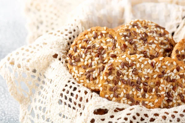 Concept of healthy nutrition: fitness cookies with sesame seeds