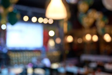 Parlak renkli noktalar. Arka plan bulanık.